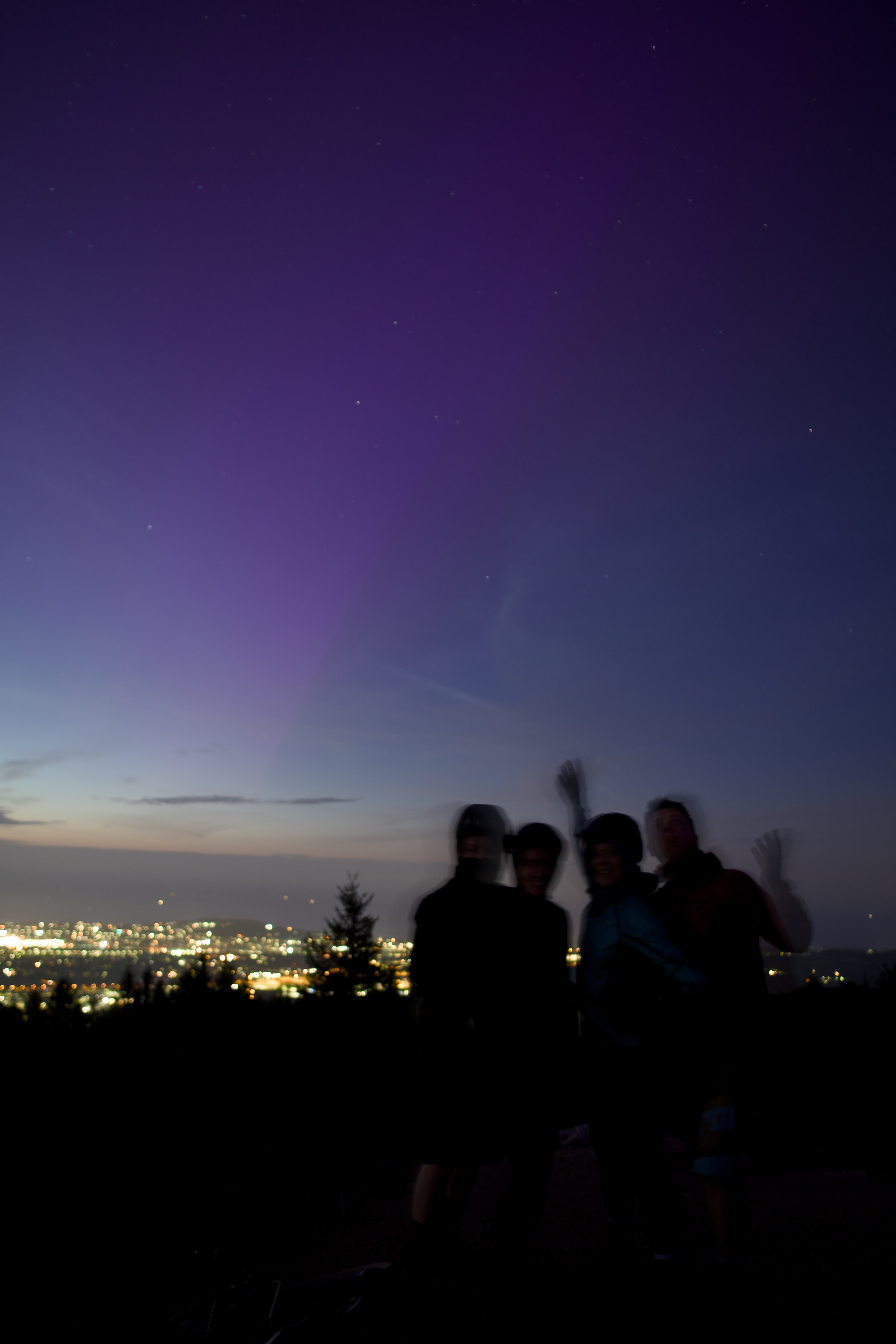 The four of us, blurred by the long exposure picture, looking at the aurora borealis over
Dublin